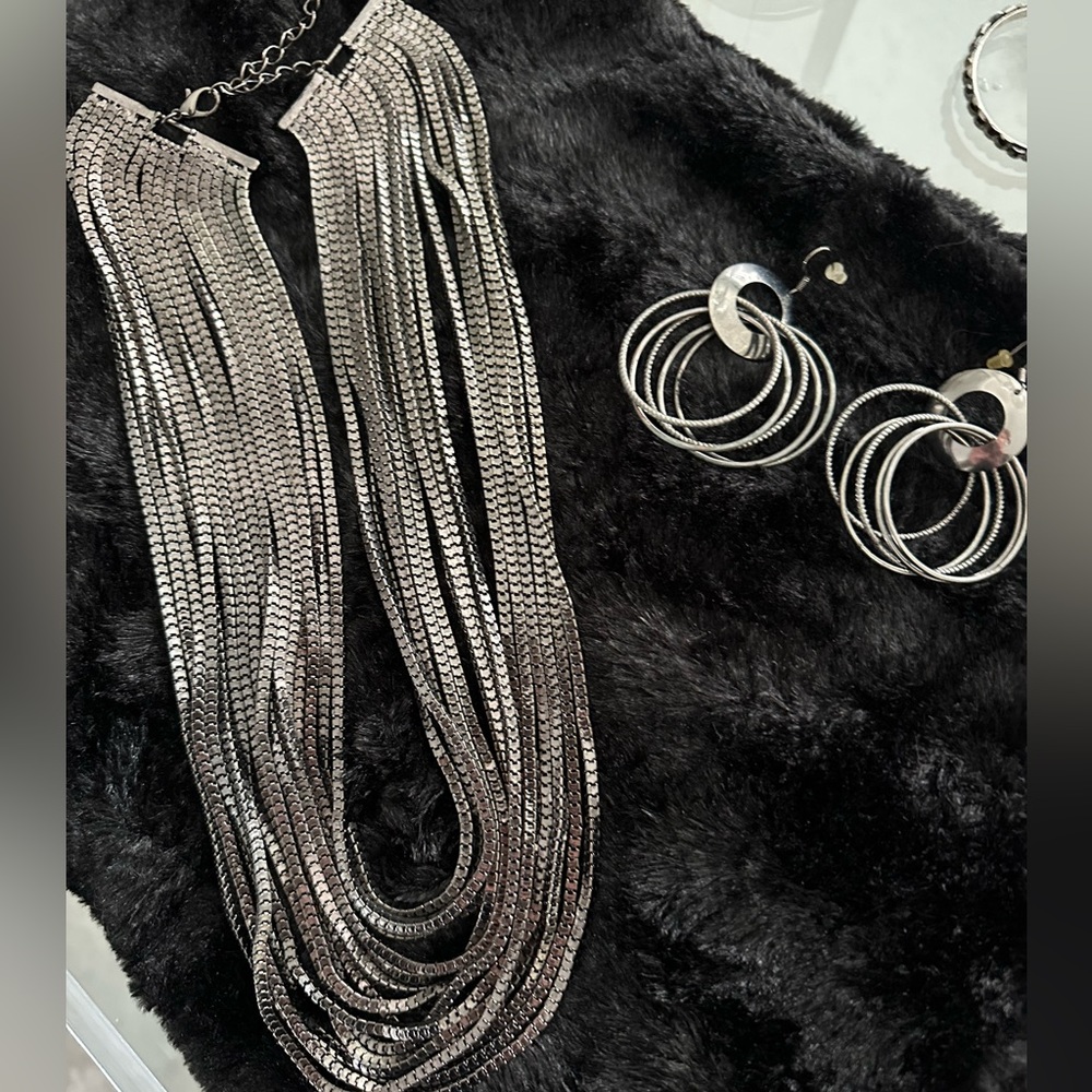 Multi-strand silver necklace and earrings